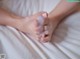 A woman's feet with a lot of soap on them.