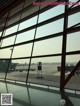 A view of an airport through a large window.