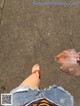 A person holding a plastic bag with food in it.